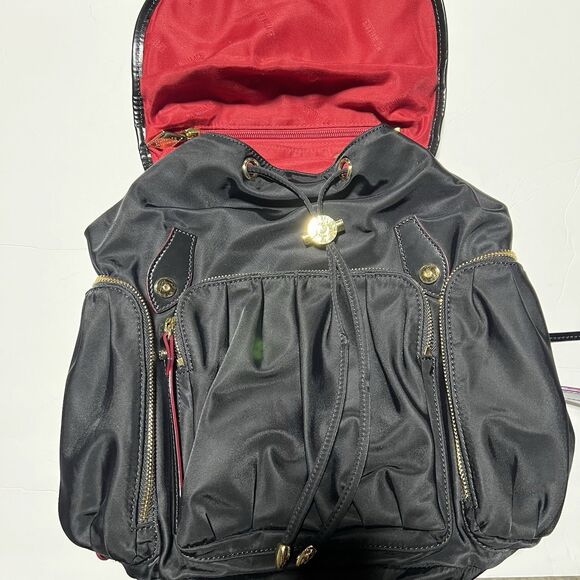 MZ Wallace Marlena backpack in black nylon and leather with red accents. main image 5